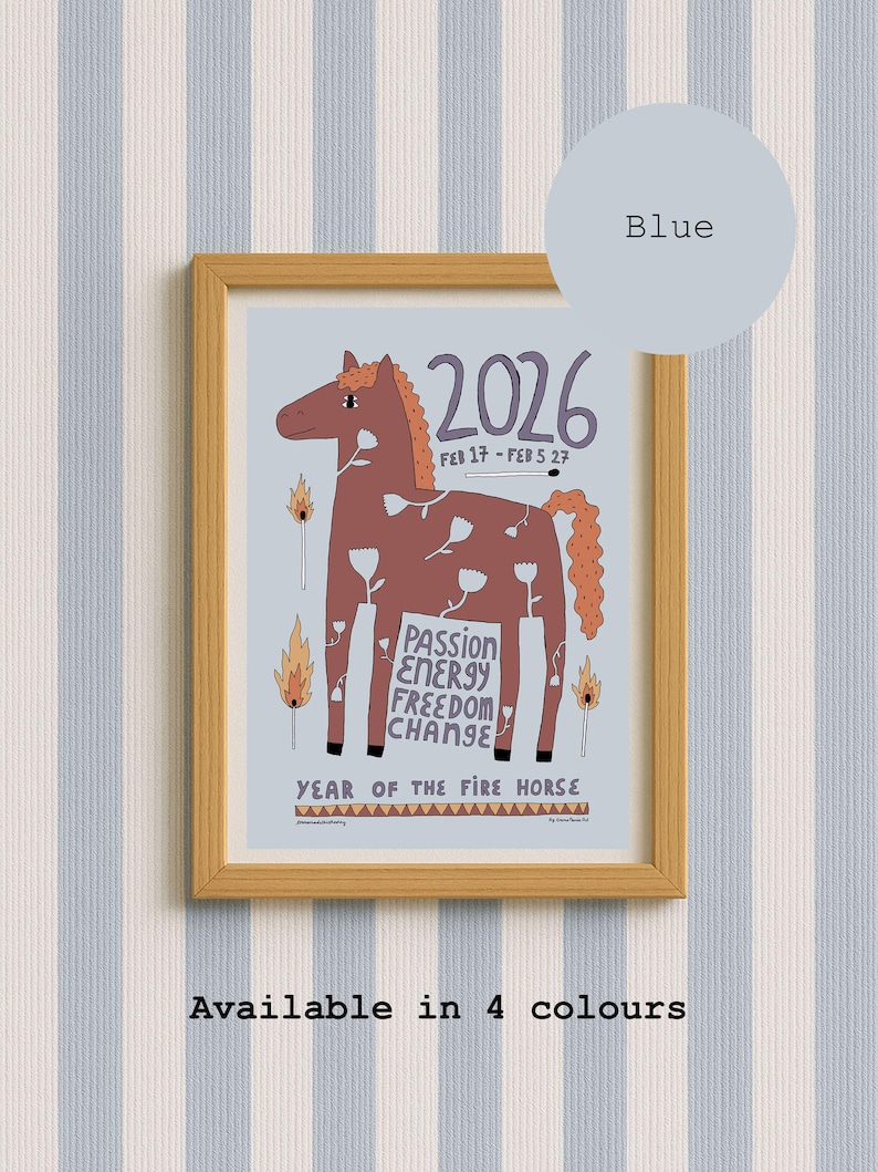A framed print featuring a brown horse illustration with white flower outlines, the text 2026, FEB 17 - FEB 5 27, PASSION ENERGY FREEDOM CHANGE, and YEAR OF THE FIRE HORSE. The design includes lit matchsticks on a light blue background.