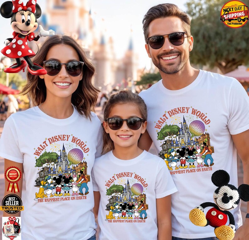 May include: Three people wearing white t-shirts with a "Walt Disney World" graphic and the text "The Happiest Place on Earth." The graphic includes cartoon characters and a castle. The family is smiling and wearing sunglasses.