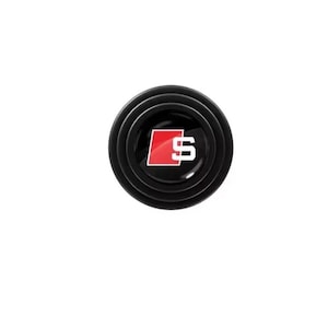 May include: Black car door protector with a red and white logo. The logo features a red square with the letter "S" and a smaller "S" inside.