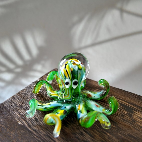 580 favorites don't lie — this hand-blown glass octopus is a tiny, wildly detailed sculpture with genuine lampworking craft behind it.