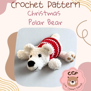 May include: A handmade crochet polar bear with a red and white striped scarf. The bear has a black nose and small black eyes. The image includes the text "Crochet Pattern Christmas Polar Bear" and the @cutecrochetfriends logo.