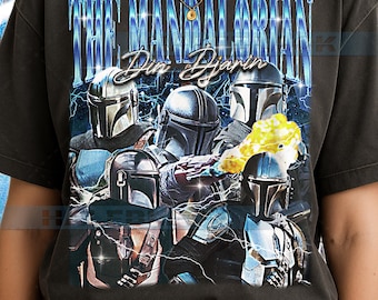 The (D1n Dj4rin) T-Shirt, Vintage Mand4lorian St4r W4rs Hero Foundling Protector Star Tee, 90s Retro, The Mand4lorian (D1n Dj4rin) #saf