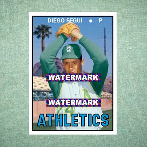 May include: A vintage baseball card featuring Diego Segui in a green and white uniform with a green cap. The card displays the text DIEGO SEGUI, P, and ATHLETICS, with two WATERMARK labels overlaid on the player's chest against a stadium background.