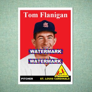 May include: A vintage baseball card featuring Tom Flanigan wearing a dark blue St. Louis Cardinals cap. The card has a bright red background, white text reading Tom Flanigan, and a yellow triangle logo with a red bird. It includes the text PITCHER.