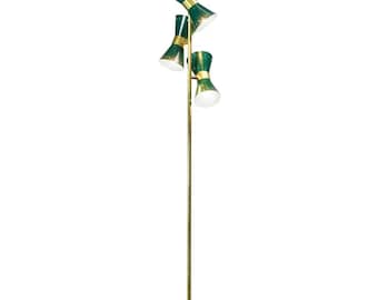 May include: A mid-century modern floor lamp with a brass pole and a white marble base. The lamp features three green cone-shaped shades with gold accents, providing focused lighting. The lamp stands approximately 60 inches tall.