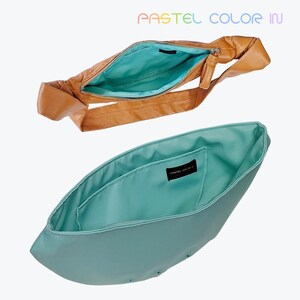 Könnte beinhalten: Zwei offene Handtaschen. Die obere Tasche ist braun mit türkisem Innenraum und Reißverschluss. Die untere Tasche ist türkis mit türkisem Innenraum. Der Text "PASTEL COLOR IN" steht oben.