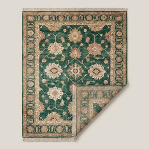 Vintage style green wool rug carpet with floral medallion motifs adding warmth and elegance to living room décor