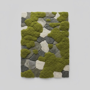 Nature inspired tufted rug with pebble and moss design