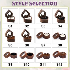 May include: A selection of wooden ring boxes in various styles. The boxes are in heart and round shapes, with a dark brown finish. Some boxes are open, displaying rings with white or black backgrounds. The text "STYLE SELECTION" is at the top.