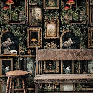 Vintage gothic gallery wallpaper with botanical forest frames, mushrooms, and woodland animals displayed behind a rustic wooden bench and stool, evoking an antique cottage library aesthetic.