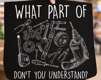May include: Black tote bag with white text reading "WHAT PART OF DON'T YOU UNDERSTAND?" featuring a detailed illustration of various tools, including pliers, gears, a drill, and a level. The design is a humorous take on DIY or mechanical work.