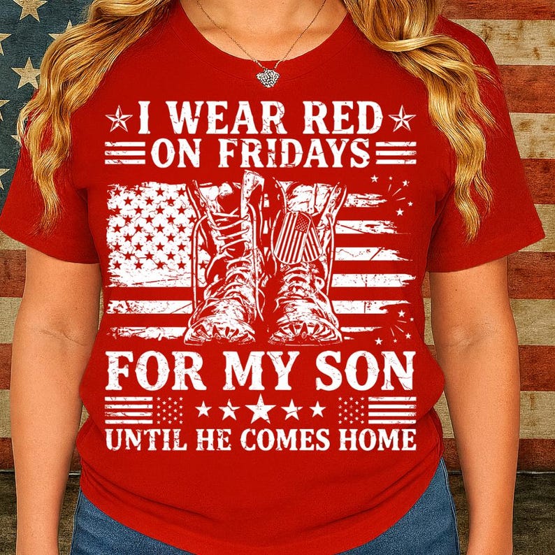 May include: Red t-shirt with the text "I WEAR RED ON FRIDAYS FOR MY SON UNTIL HE COMES HOME". The design includes an American flag and a pair of boots.