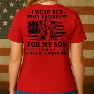 May include: A red t-shirt with the text "I WEAR RED ON FRIDAYS FOR MY SON UNTIL HE COMES HOME." The design includes an American flag and military boots.