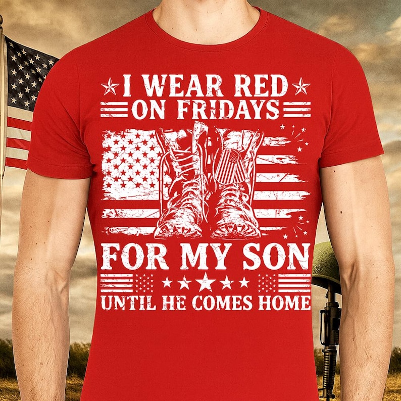 May include: Red t-shirt with the text "I WEAR RED ON FRIDAYS FOR MY SON UNTIL HE COMES HOME." The design includes an American flag and combat boots. The shirt is a crew neck.