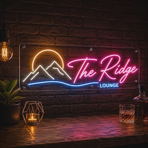 May include: A rectangular neon sign mounted on a dark brick wall featuring a yellow sun, white mountain outlines, and a blue wavy line. The sign displays the pink cursive text The Ridge and the blue block text LOUNGE in a modern aesthetic.