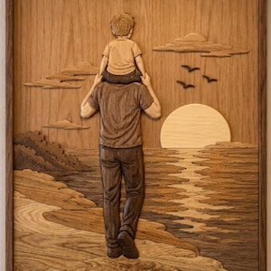 May include: Wooden wall art depicting a father carrying a child on his shoulders, walking towards a sunset over the ocean. The artwork is carved from wood, featuring detailed textures and a warm color palette. Includes clouds and birds.