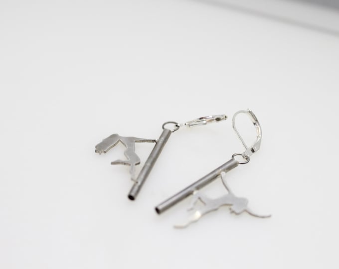 Pole dancer earrings
