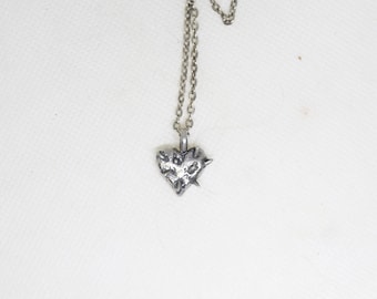 Spiked heart necklace