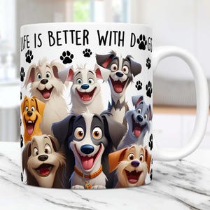 May include: White ceramic mug featuring a colorful illustration of cartoon dogs with happy expressions. The mug has the text "LIFE IS BETTER WITH DOGS" and paw prints. The mug has a white handle and is suitable for hot or cold beverages.