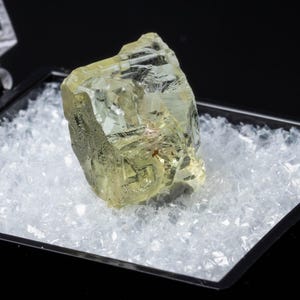 May include: A set of three ceramic mugs with a speckled, matte finish. Each mug is a different colour: light blue, cream, and grey. The mugs have a simple, modern design with a rounded shape and a handle.