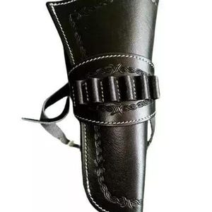 May include: A black leather holster featuring white contrast stitching and an integrated cartridge loop band across the centre. The holster is decorated with embossed barbed wire patterns along the edges and includes a side strap attachment.
