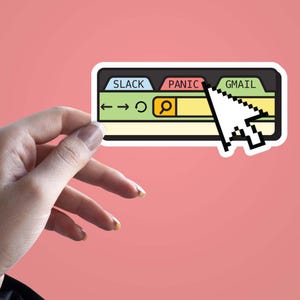 May include: A sticker featuring a stylized browser window with tabs labeled "SLACK", "PANIC", and "GMAIL". A white cursor hovers over the window. The background is a solid pink color.