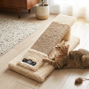 May include: A beige cat scratching post with a sisal rope scratching surface and a plush base. A brown tabby cat is lying on the base, playing with the post. A small toy mouse is on the floor.