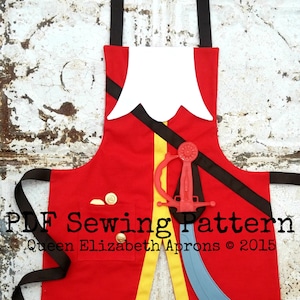 Puede incluir: Delantal rojo con temática pirata con cuello blanco, correas negras y detalles amarillos. Incluye una espada de juguete y botones dorados. El delantal tiene texto que dice "PDF Sewing Pattern" y "Queen Elizabeth Aprons © 2015".