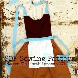 Puede incluir: Un delantal marrón y blanco con lazos de cinta azul. El delantal tiene un babero blanco con un bolsillo y una falda marrón. El texto "PDF Sewing Pattern Queen Elizabeth Aprons ©2014" está impreso en el delantal.