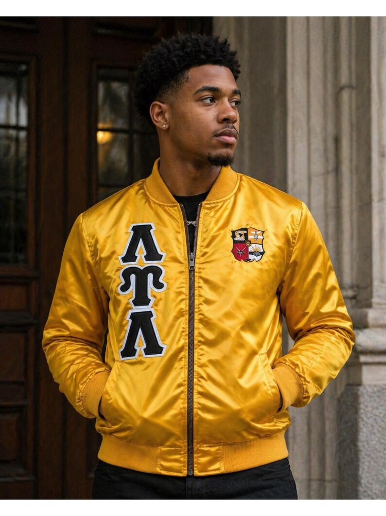 Stylish premium satin Greek letter jacket featuring embroidered details, soft lining, and custom personalization options. Perfect for sorority and fraternity events, probate shows, crossing celebrations, and everyday Greek fashion.