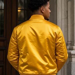 Stylish premium satin Greek letter jacket featuring embroidered details, soft lining, and custom personalization options. Perfect for sorority and fraternity events, probate shows, crossing celebrations, and everyday Greek fashion.