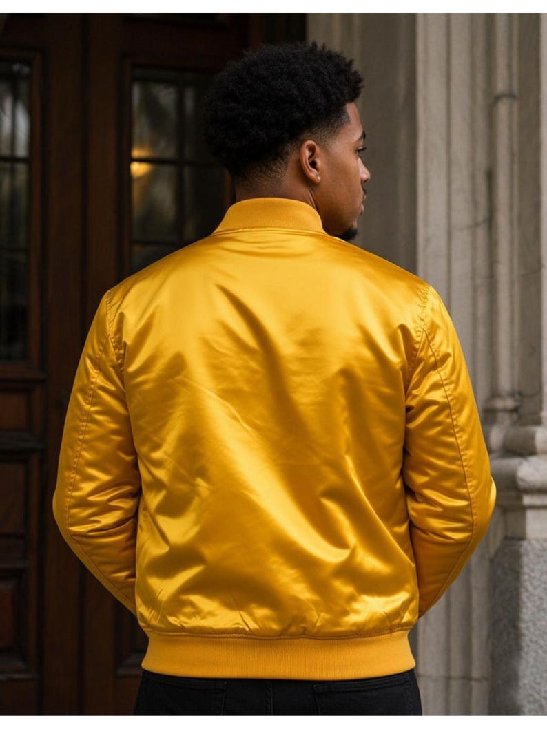 Stylish premium satin Greek letter jacket featuring embroidered details, soft lining, and custom personalization options. Perfect for sorority and fraternity events, probate shows, crossing celebrations, and everyday Greek fashion.