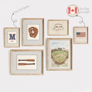 May include: A gallery wall set of six framed prints featuring baseball-themed illustrations including a glove with a ball, two bats, a stadium, a letter M, and an American flag. Text includes "Long Live Boyhood" and "Our Flag America".