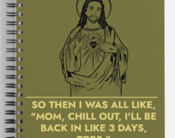 May include: Spiral-bound notebook with a green cover featuring a black and white illustration of a religious figure with a halo. The notebook has the text: "SO THEN I WAS ALL LIKE, 'MOM, CHILL OUT, I'LL BE BACK IN LIKE 3 DAYS, TOPS.'"