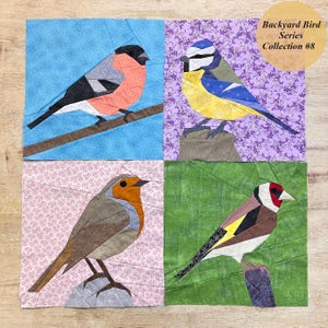 May include: A set of four paper pieced bird quilt blocks. The blocks feature a robin, a blue tit, a goldfinch, and a bullfinch. The blocks are all set against a background of different floral prints. The title "Backyard Bird Series Collection #8" is printed in a yellow circle at the top of the image.