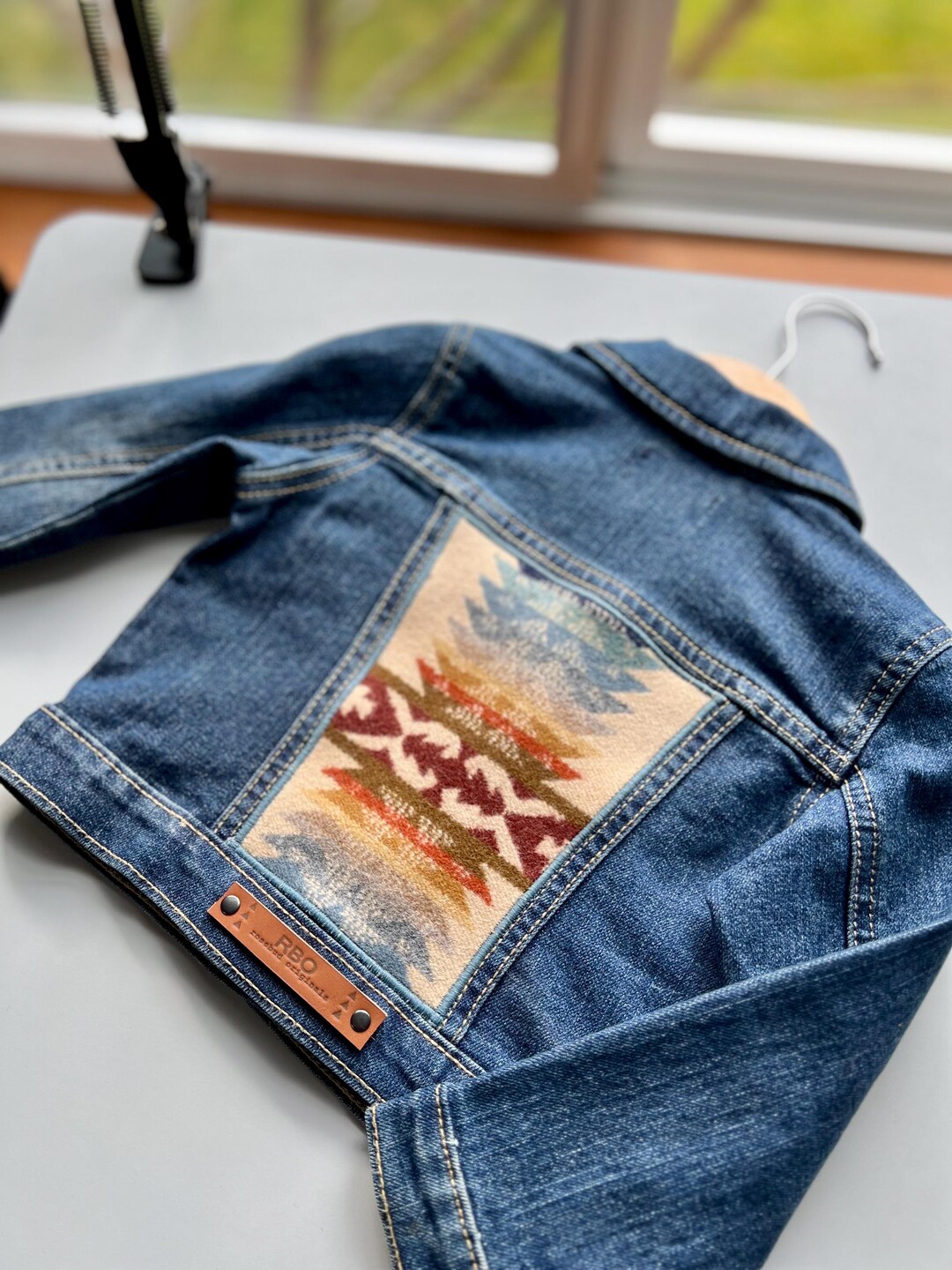 Curated visual reference: Visual Reference: New Repurposed Southwestern Wool Denim Jacket Size 2T Rosebud