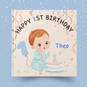 May include: A children's book cover with a watercolor illustration. The cover features a baby in a blue onesie, a cake with a number one candle, and the text "Happy 1st Birthday Theo". A blue number one balloon is also present.