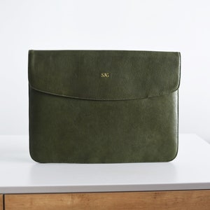 Moss green leather laptop sleeve with gold monogram—minimalist envelope case for MacBook or Surface.