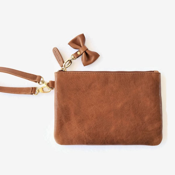 OOPSIE - Leather wristlet clutch with bow tie - BEAUTY IMPERFECTIONS