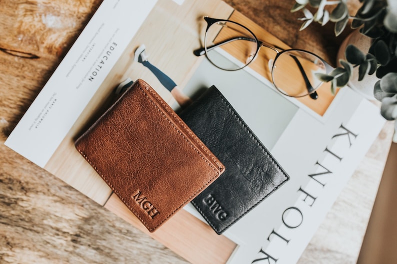 Brown and black leather wallets with monogram initials embossed – personalized men’s gifts, minimalist bifold wallets