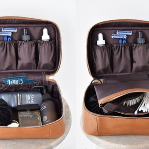 Men’s leather Dopp kit packed with various grooming items, elastic pockets for razors and droppers, detachable magnetic zip pouch for small essentials