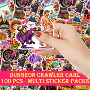 May include: A hand holds a sticker featuring a cartoon man pulling down his underwear, with a dinosaur ridden by a cat. The background is a collage of stickers. The text "DUNGEON CRAWLER CARL" and "100 PCS - MULTI STICKER PACKS" is at the bottom.