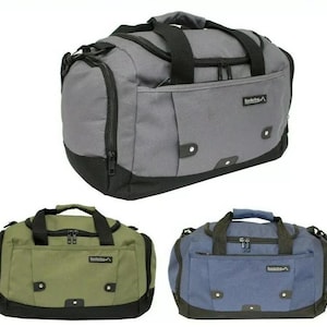 May include: Three duffel bags in grey, olive green, and blue. Each bag has a black base, handles, and accents. The bags feature a zipped main compartment, a front pocket, and the brand name "Borderline" on the front.