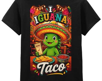 May include: A black short-sleeve t-shirt featuring a graphic of a green iguana wearing a colorful sombrero. The iguana holds a menu and sits before a plate of tortilla chips and a bowl of salsa. The text reads I IGUANA Taco in colorful letters.
