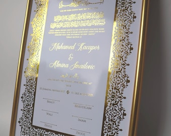 May include: A rectangular wedding certificate in a gold frame featuring gold foil Arabic calligraphy and German text. The document includes the names Muhamed Kacapor and Almina Smailovic, with lines for signatures labeled Braut, Brautigam, Wali, Imam, and Zeuge.