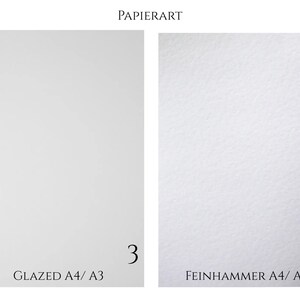 May include: Two rectangular sheets of white paper labeled PAPIERART. The left sheet is smooth and marked with the number 3 and text GLAZED A4/ A3. The right sheet has a textured surface and is marked with the number 4 and text FEINHAMMER A4/ A3.