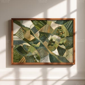 May include: A framed artwork featuring an abstract landscape with a patchwork of fields in shades of green, beige, and white. The artwork has a wooden frame and is mounted on a white wall. The artwork's design is reminiscent of a map.
