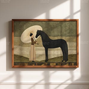 May include: A framed art print depicting a person with a parasol and a black horse. The artwork has a muted colour palette and is set in a brown wooden frame. The background features a landscape design.