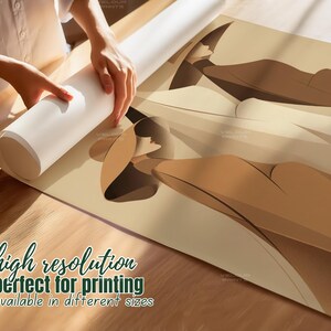 May include: A rolled-up white canvas print with a beige abstract design is being unrolled on a wooden surface. The print features a high-resolution design, perfect for printing and available in different sizes.