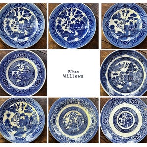 May include: Nine blue and white Willow pattern plates. Each plate features a different variation of the classic design, with scenes of pagodas, bridges, and landscapes. The plates are arranged in a grid, showcasing the variety of patterns.